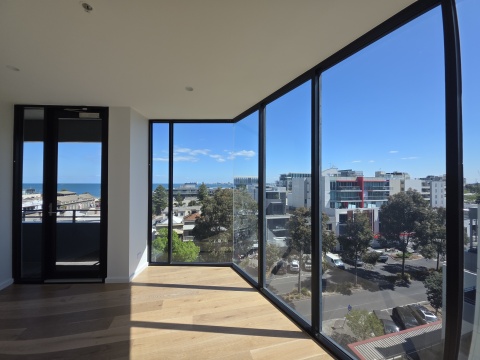 3M Prestige 70 window film installed on floor to ceiling apartment windows in Port Melbourne