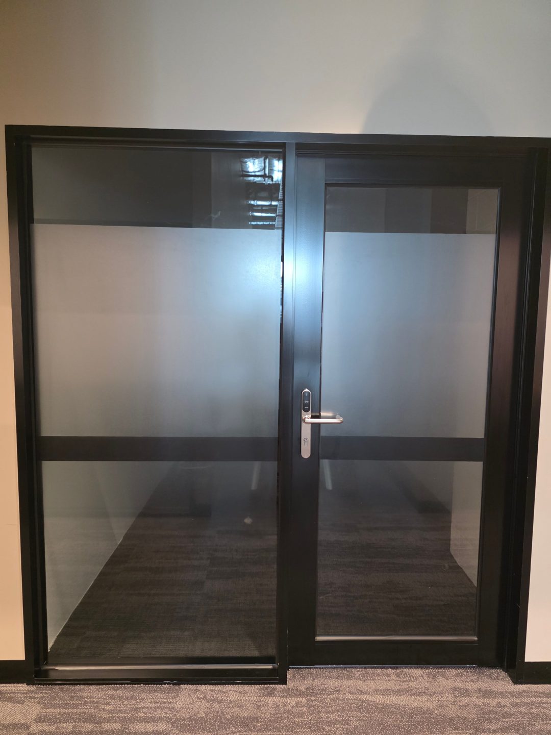 Frosted window film on a glass office door and sidelight at 287 Lonsdale Street, Melbourne