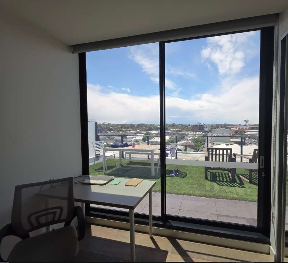 Interior view through 3M Prestige 40 Exterior film on a Richmond high-rise, showing clear outward city view