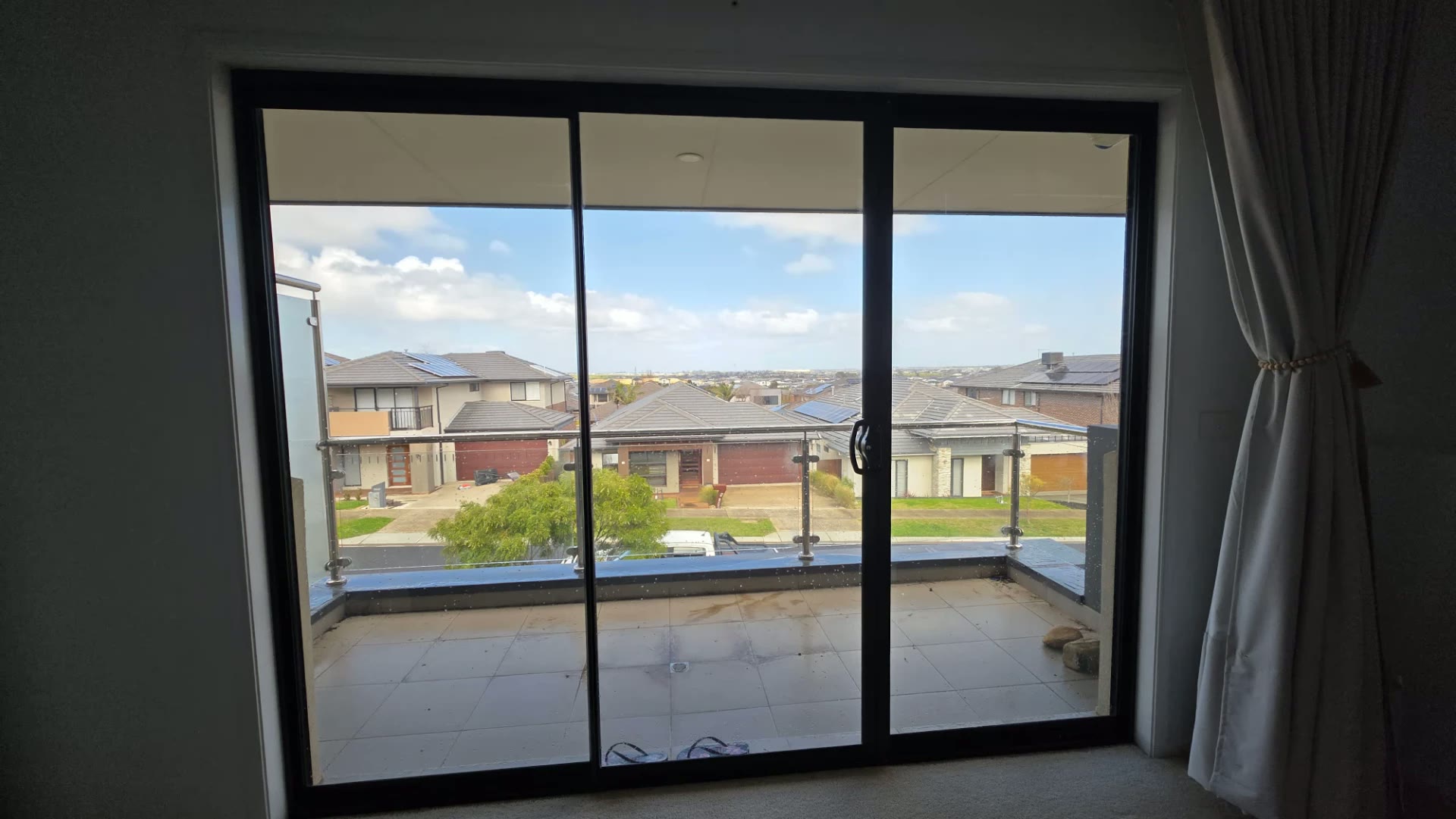 3M Night Vision 25 window film installed with curtains in a Clyde North home